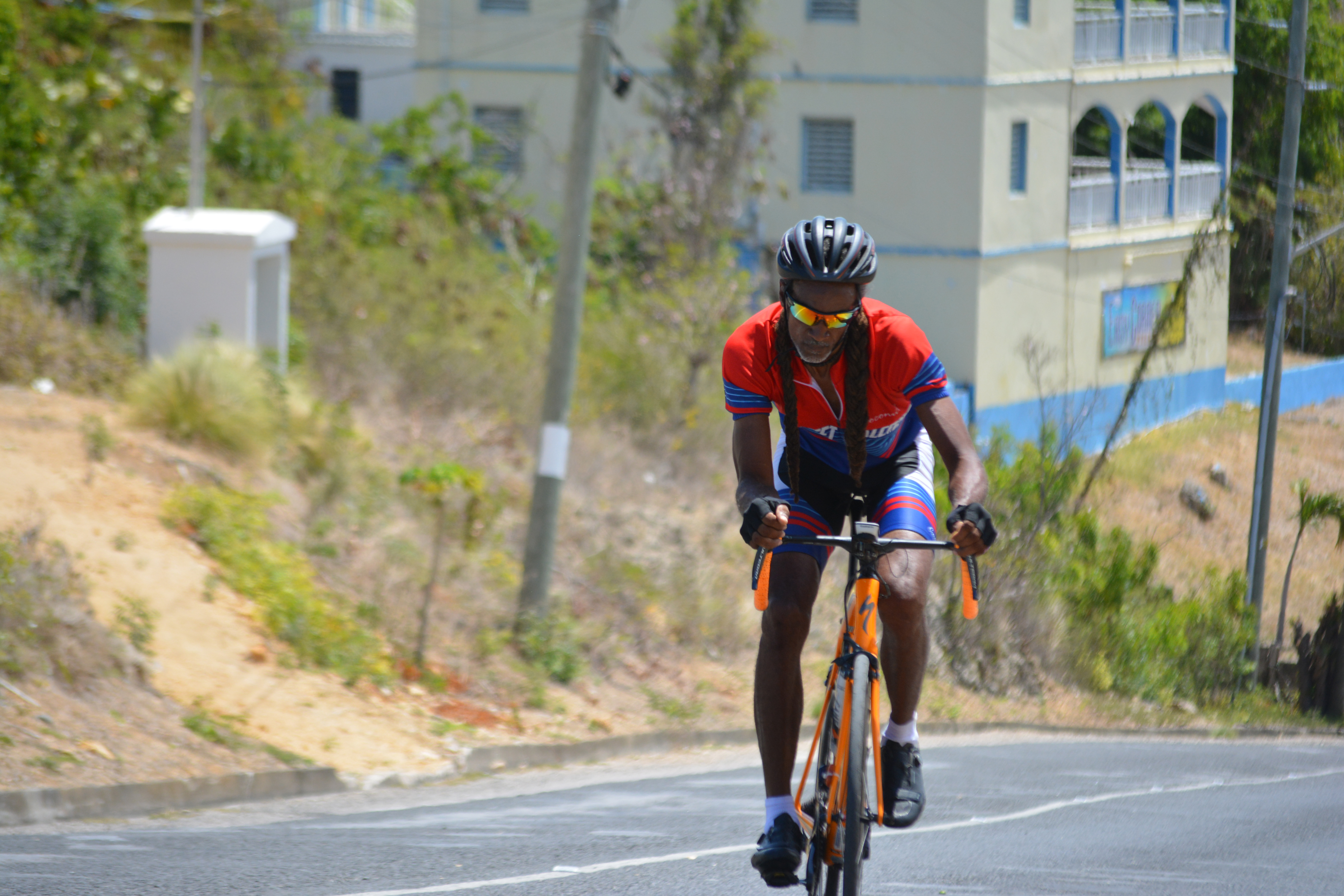 Levi Baron, a member of the Dominica Cycling Association participates in the 20th John T. Memorial Cycling Race in the masters category, Anguilla, July 21, 2019. Baron finished ninth in the event.
